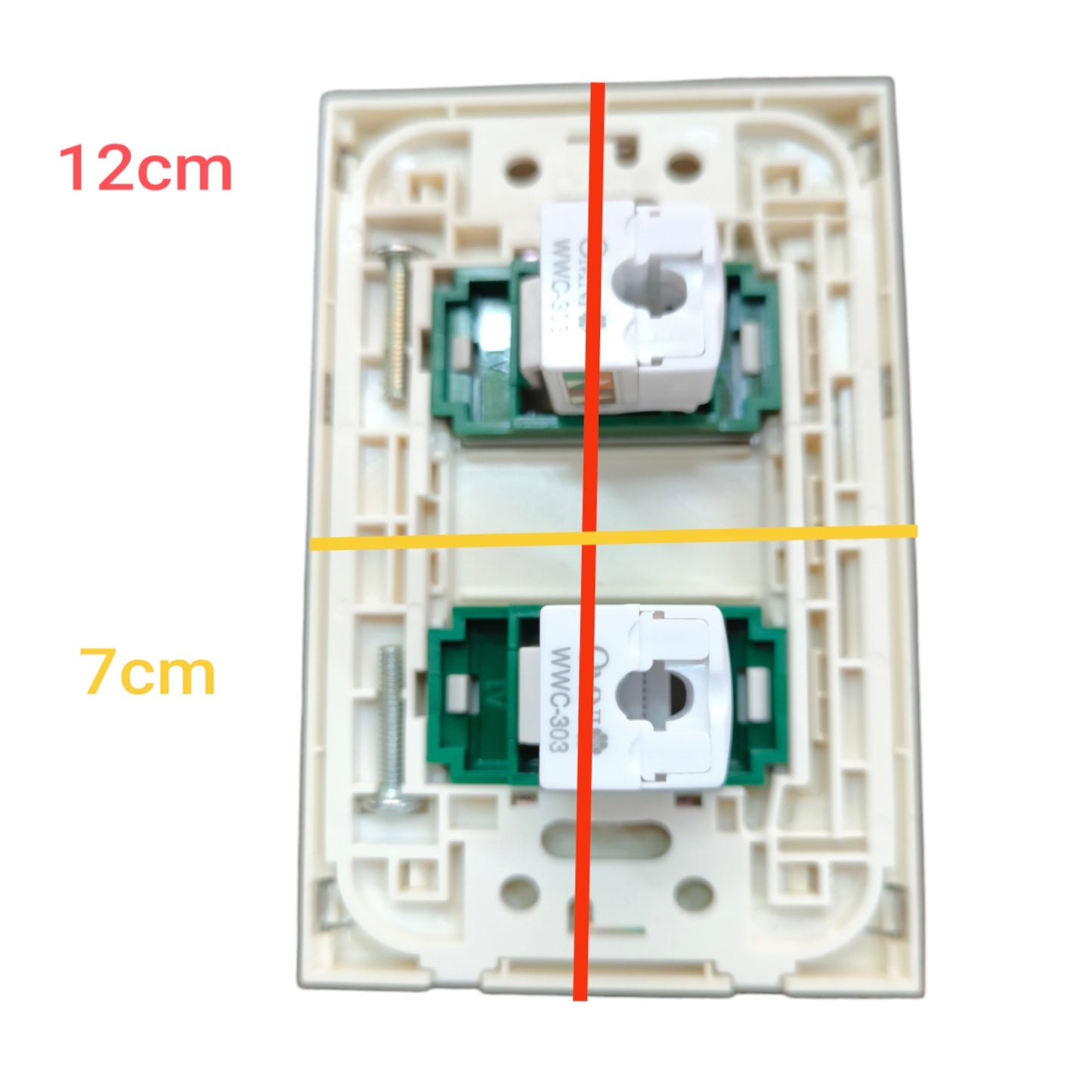 A wall switch panel backplate shown on a white background with overlaid dimension labels: 12cm vertically and 7cm horizontally, plus red and yellow measurement lines crossing the product.