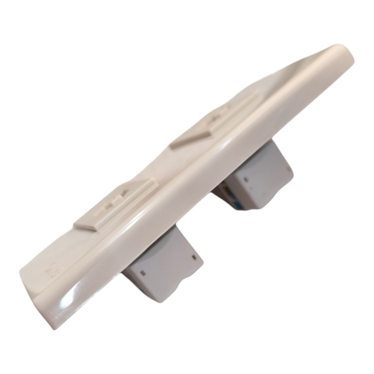 An off-white plastic replacement part, likely a door handle trim or latch assembly, shown against a plain white background.