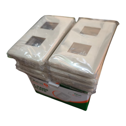 A stack of white mini double-gang wall switch plates wrapped in clear plastic, with a green and white cardboard box visible at the bottom. The brand name 'EMINI' is partially visible on the box.
