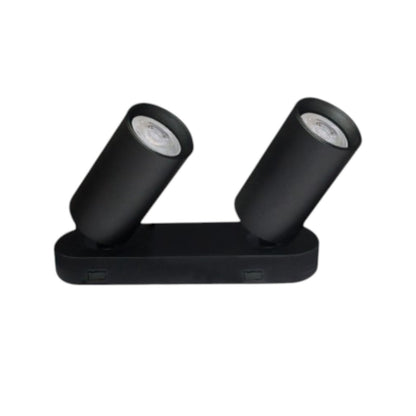 A black dual-head spotlight fixture with adjustable cylindrical heads on a rectangular base, shown against a plain white background.