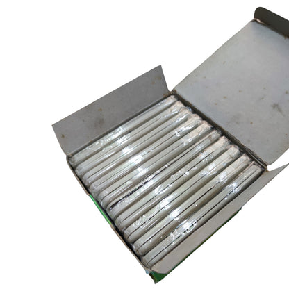 An open cardboard box containing multiple white cylindrical items wrapped in clear plastic, photographed on a plain white background.