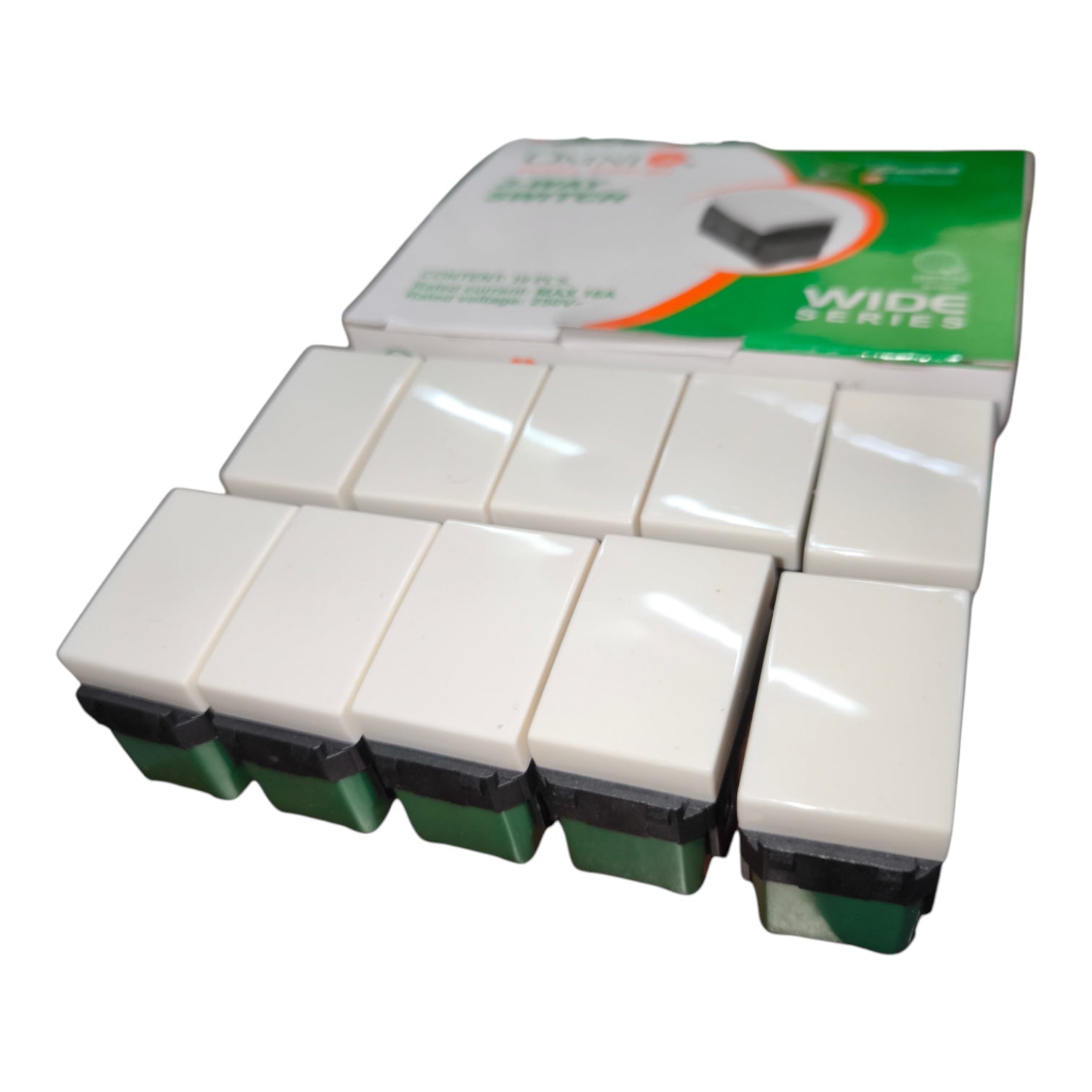 A pack of 12 wide series single switch sockets, featuring cream-colored plastic tops with green and black bases, shown next to their green and white retail packaging box.