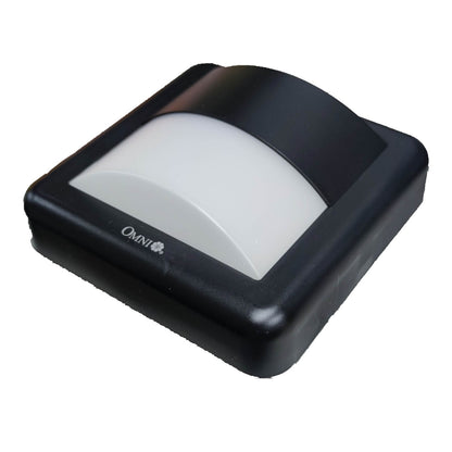 A black outdoor motion sensor light fixture with a frosted white lens, shown at an angle on a white background. The brand name 'OMNI' is printed on the side.