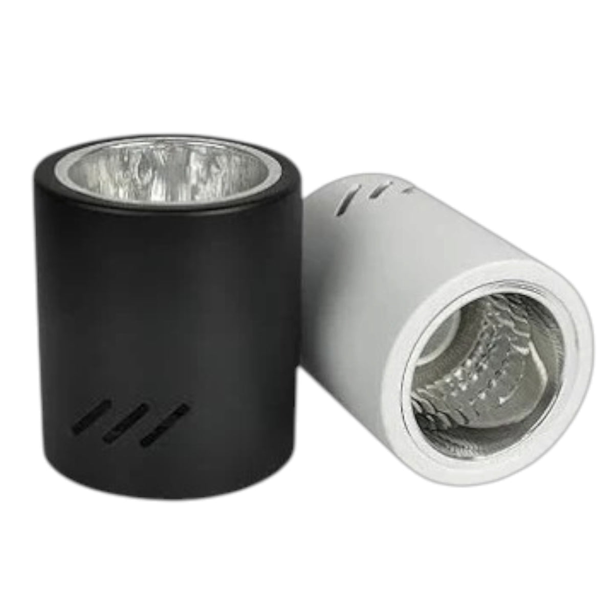 Two cylindrical light reflector or lamp housing components on a plain white background, one matte black and one metallic silver.