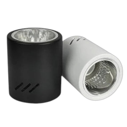 Two cylindrical light reflector or lamp housing components on a plain white background, one matte black and one metallic silver.