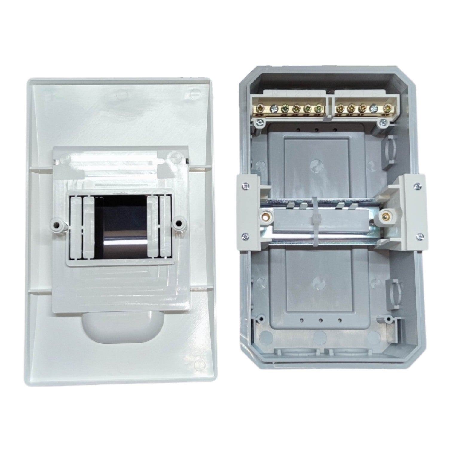 An electrical junction box shown in two views: the front cover plate on the left and the open internal compartment on the right, both in light gray plastic with brass screw terminals.