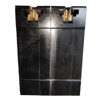 A black plastic dual-cell battery with gold-colored terminal connectors on a plain white background.