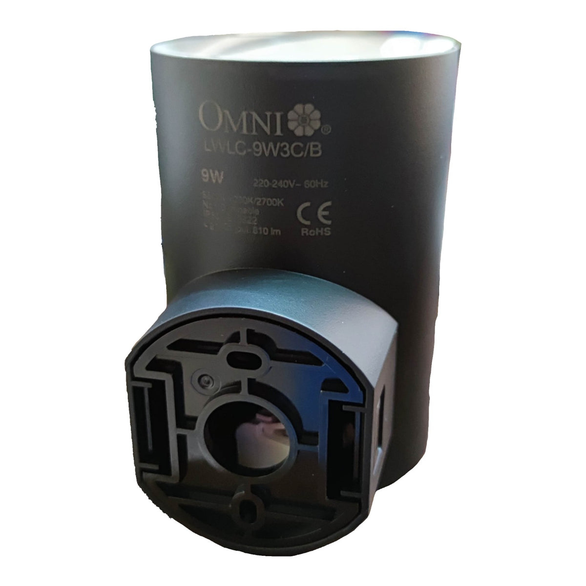 A black cylindrical Omni LMLC-9W3C/B 9W smart bulb socket adapter, showing the printed specifications and the front socket interface, on a plain white background.