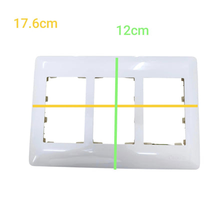 White 3-gang light switch plate with dimension markings showing 17.6cm width and 12cm height, overlaid with yellow and green measurement lines.