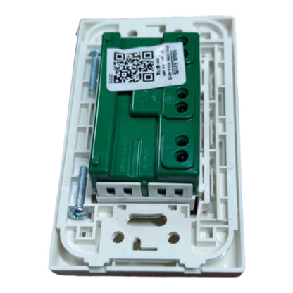 A white plastic light switch socket cover plate with a green internal component and a white QR code sticker, shown on a white background.