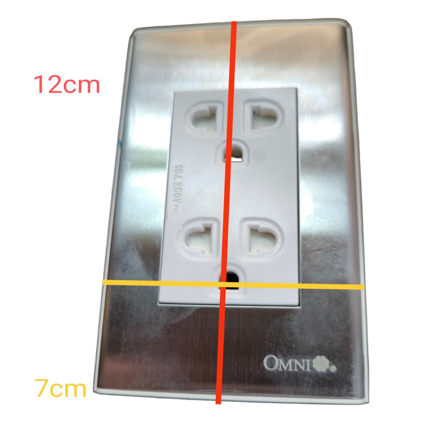 A brushed stainless steel electrical outlet cover plate with a white two-hole outlet insert, shown on a white background with red and yellow dimension lines indicating 12 cm height and 7 cm width. The brand name OMNI is visible in the bottom right corner.