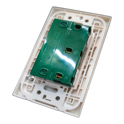 A replacement backplate for a single-gang light switch, featuring a beige plastic outer cover with a green circuit board insert, shown on a white background.