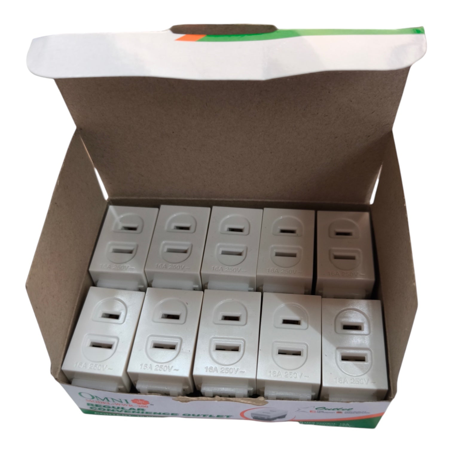 A cardboard box containing ten white double-socket electrical wall outlets, photographed against a plain white background.