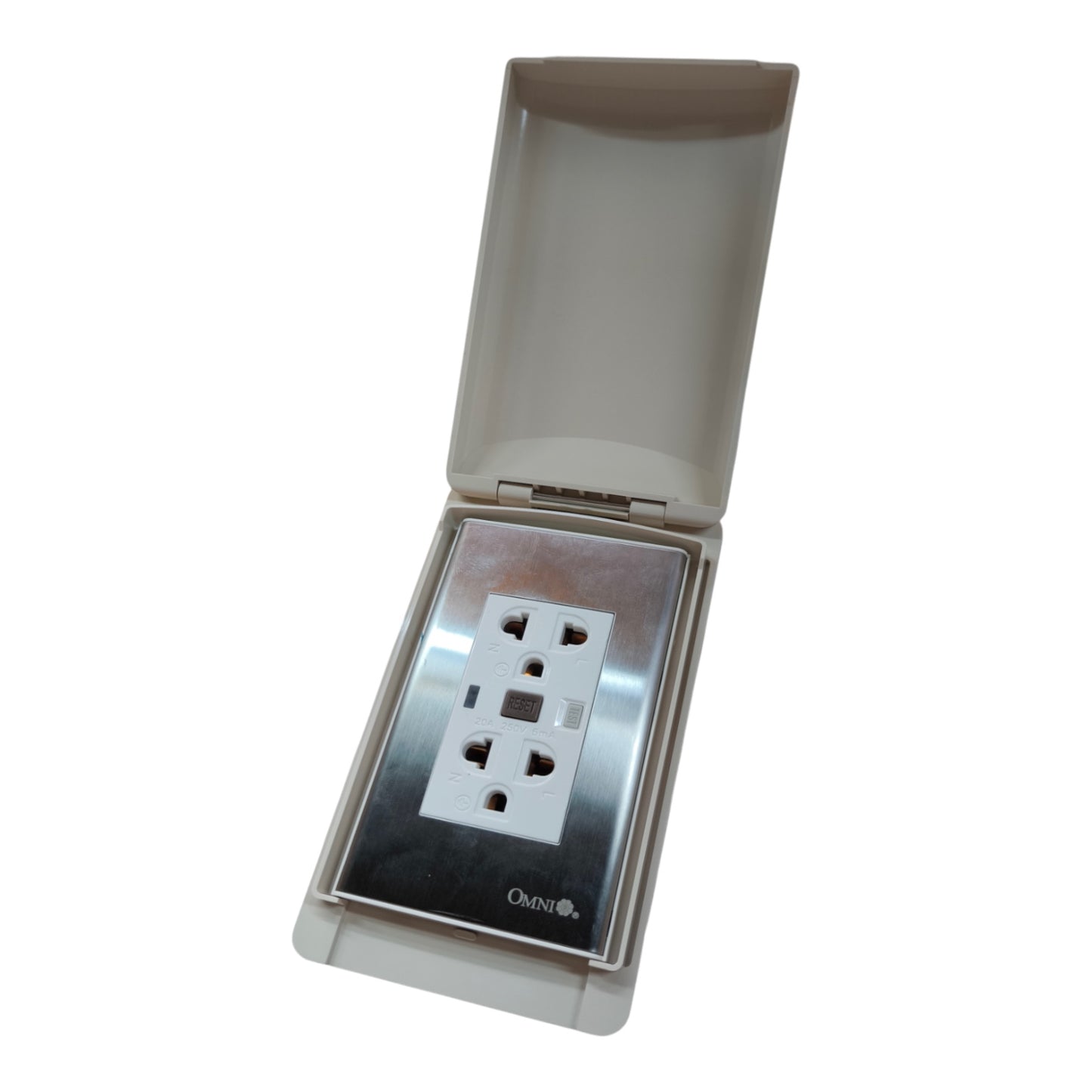An outdoor waterproof electrical outlet cover with an open hinged lid, showing a white three-pin socket protected by a clear cover over a brushed stainless steel faceplate. The brand name 'Outdoor' is printed at the bottom of the plate.