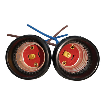 Two electrical plug sockets with visible wiring on a white background