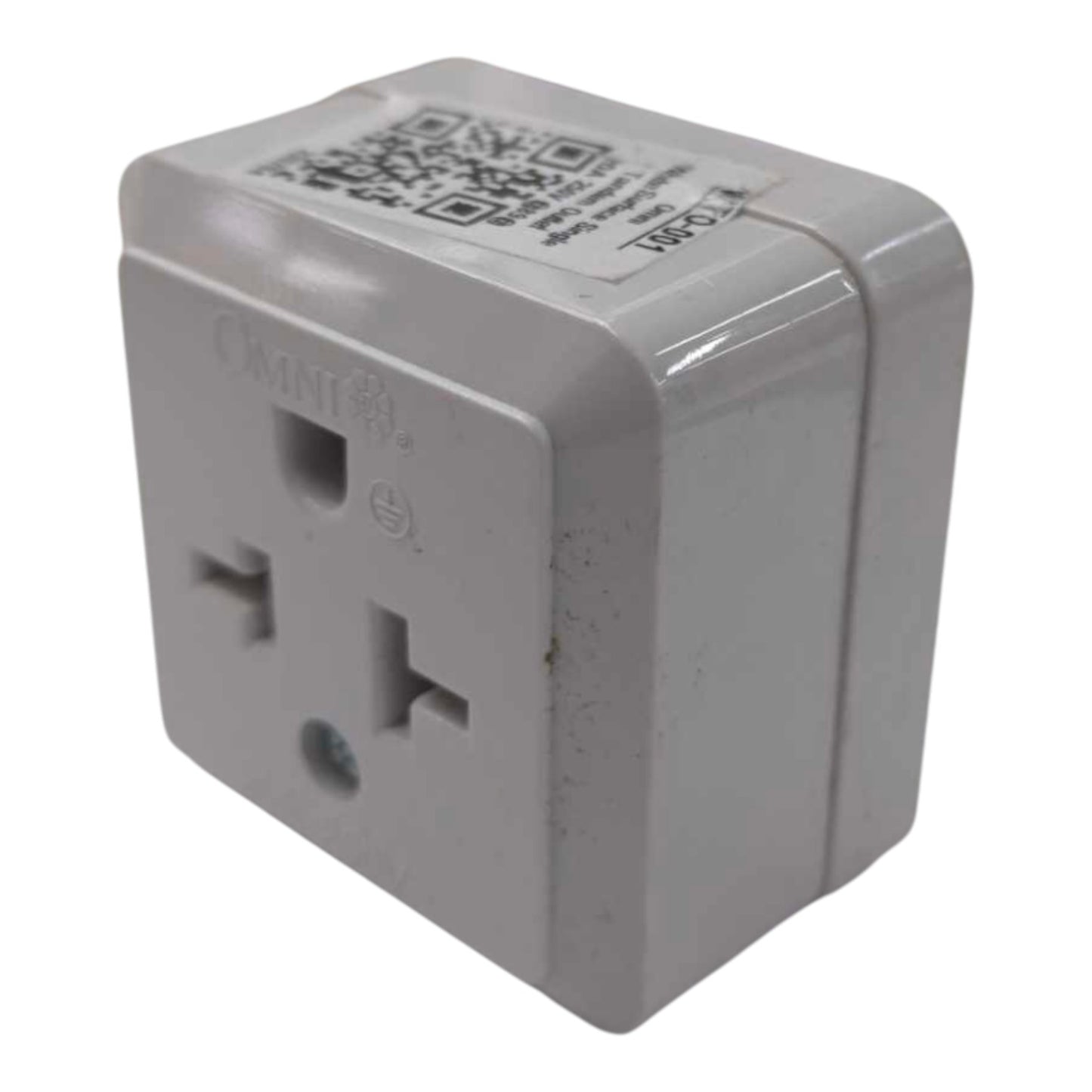 A white plastic OMNI international travel adapter with a US outlet, shown on a plain white background.