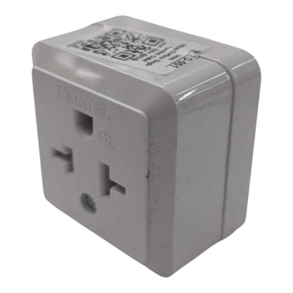 A white plastic OMNI international travel adapter with a US outlet, shown on a plain white background.