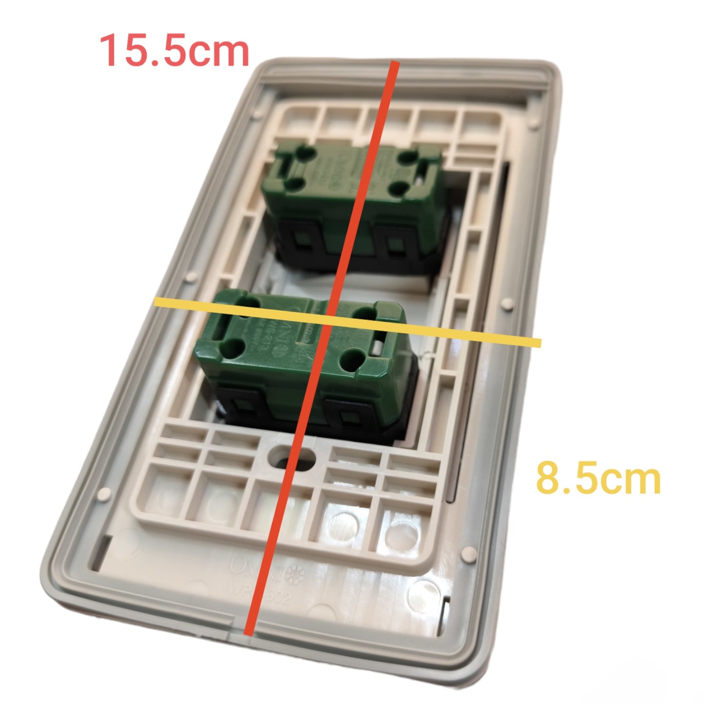 A double-gang wall switch panel shown on a white background with red and yellow measurement lines and text indicating dimensions 15.5cm and 8.