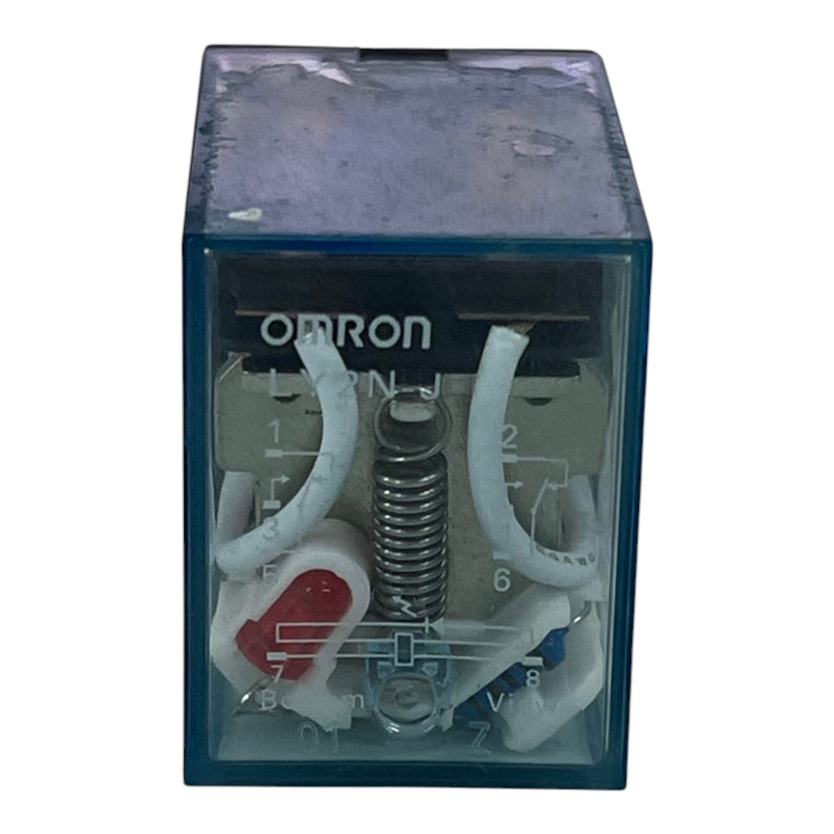 An Omron relay electrical component with a transparent blue plastic case, showing internal metal contacts, a spring, and white plastic components on a white background.