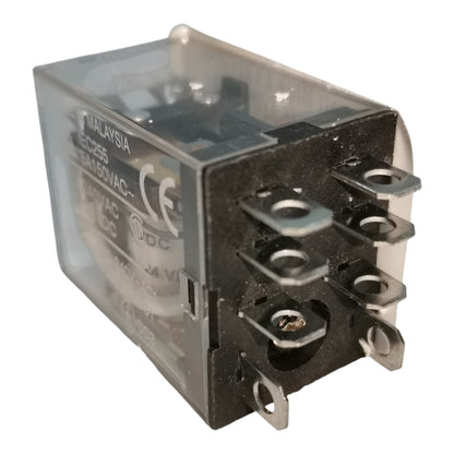 A small electrical relay component with a clear plastic housing, black internal mechanism, and metal terminal posts on the front, photographed on a plain white background.