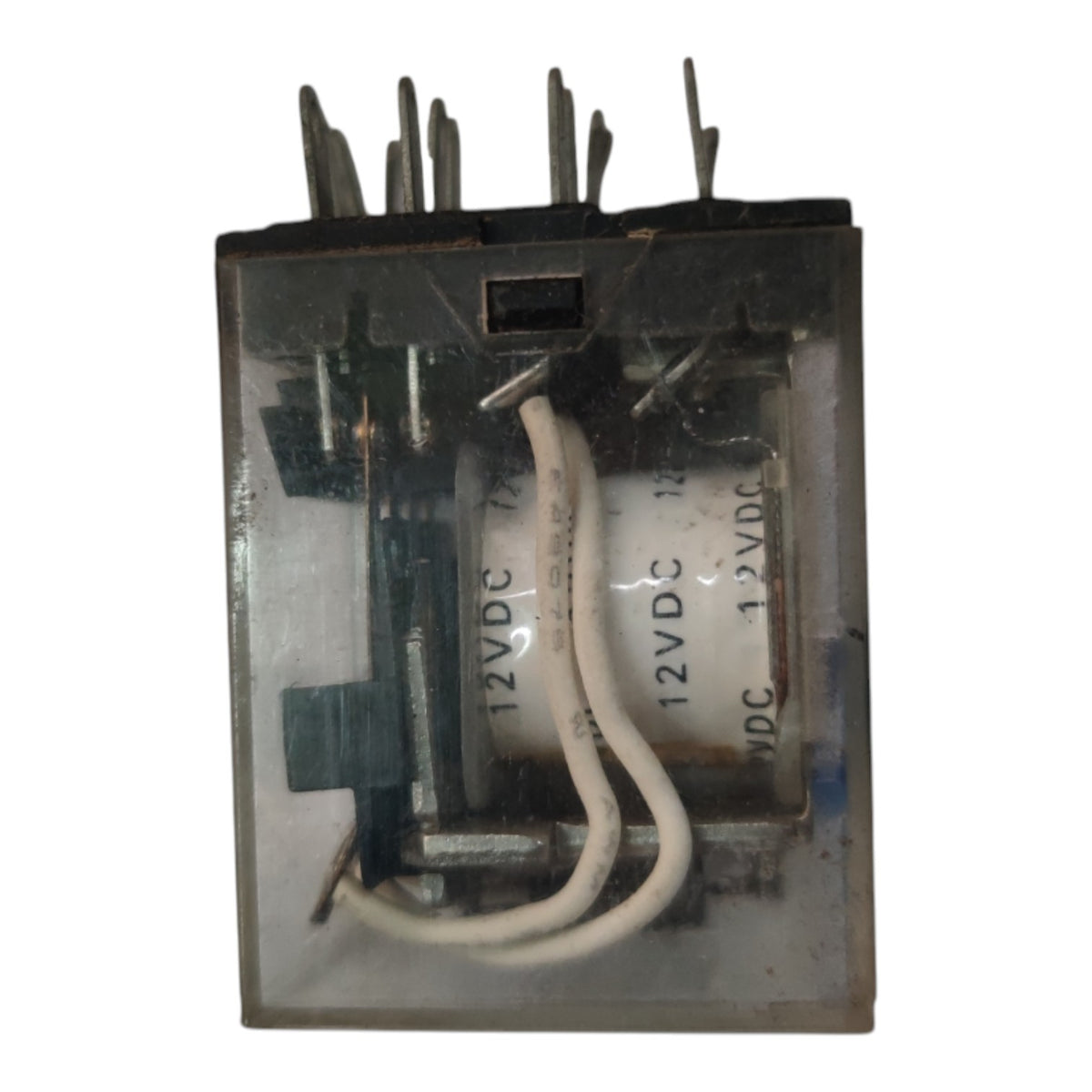 A 12VDC electrical relay with a clear plastic housing, internal coil, and white wires, shown against a plain white background.