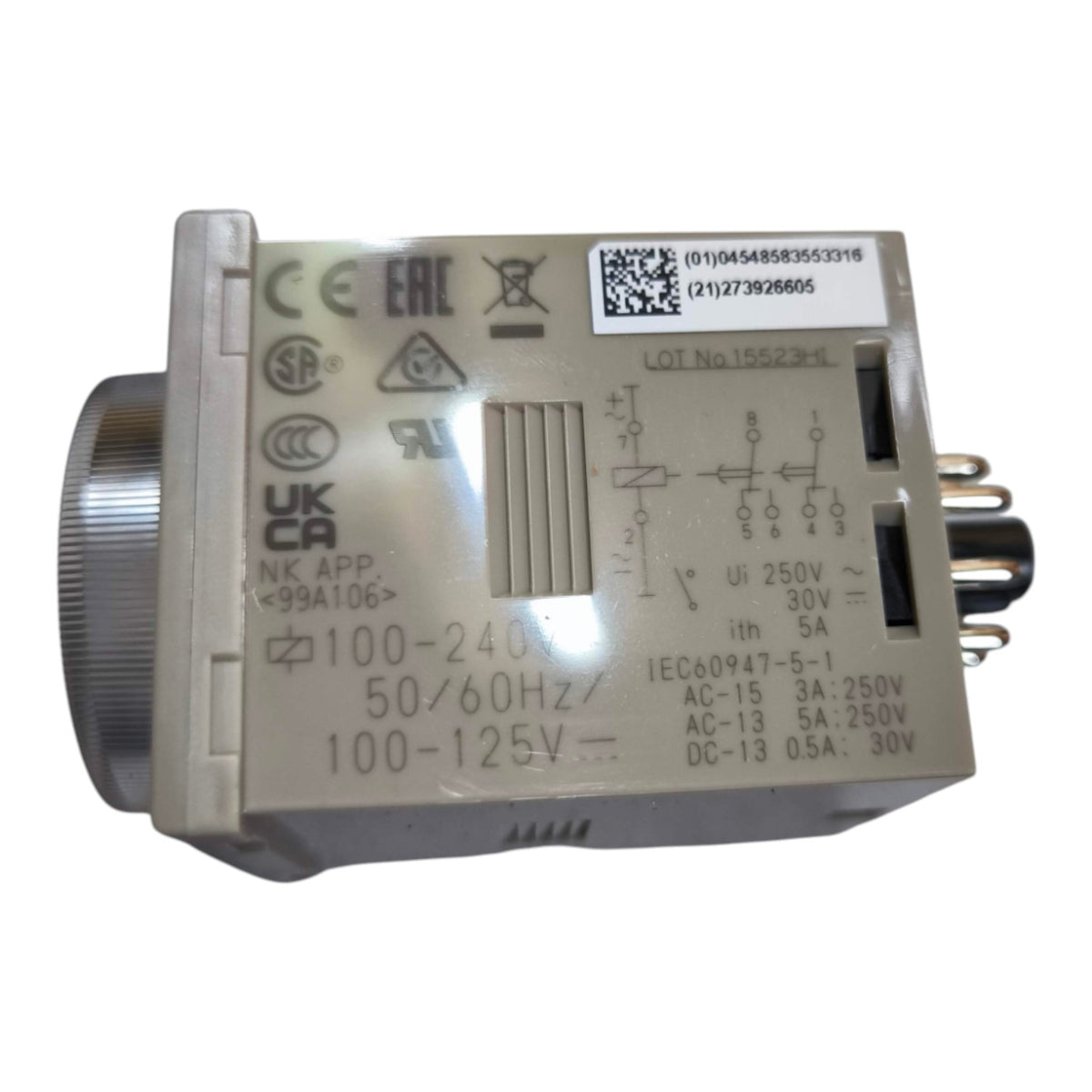 An industrial electrical component, specifically an NK App 99A106 rotary switch module, shown on a plain white background. The unit is beige with a silver metal rotary knob on the left and black terminal connectors on the right side.