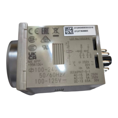 An industrial electrical component, specifically an NK App 99A106 rotary switch module, shown on a plain white background. The unit is beige with a silver metal rotary knob on the left and black terminal connectors on the right side.