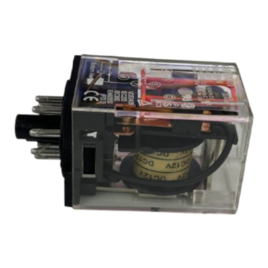 A miniature electrical relay with a clear plastic housing, black metal core, and multiple terminal pins on the left, shown against a plain white background.