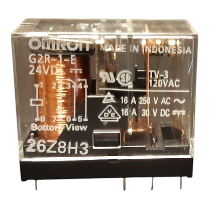 An Omron G2R-1-E 24VDC TV-3 120VAC relay, model 26Z8H3, shown from the bottom view with its clear plastic casing and black base on a white background.