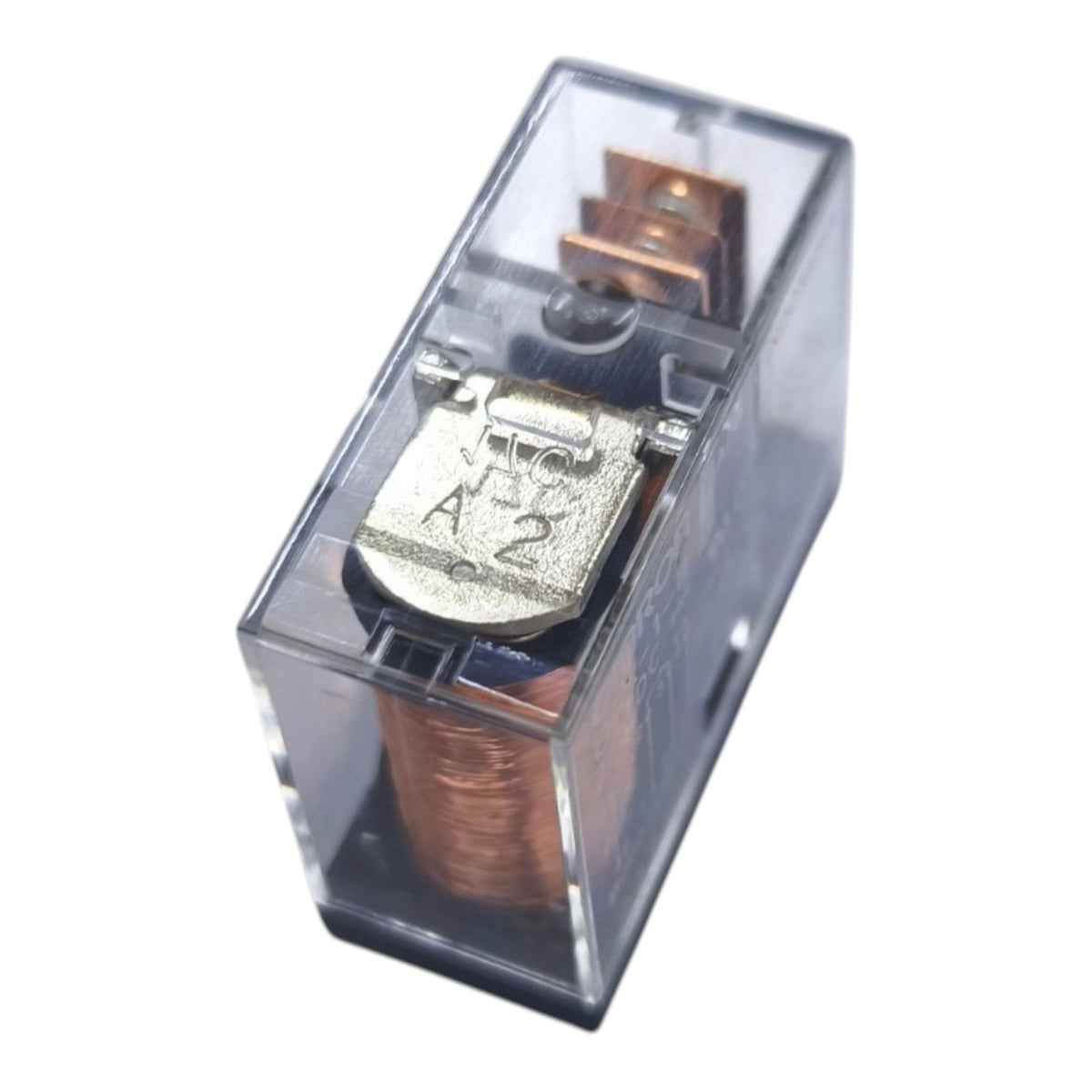 A small transparent plastic electrical relay component with copper-colored coil and metal terminals, shown on a plain white background.