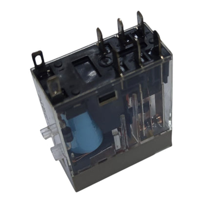 A small electrical relay component with a transparent housing, black top and base, internal blue coil, and metal terminals, shown on a plain white background.