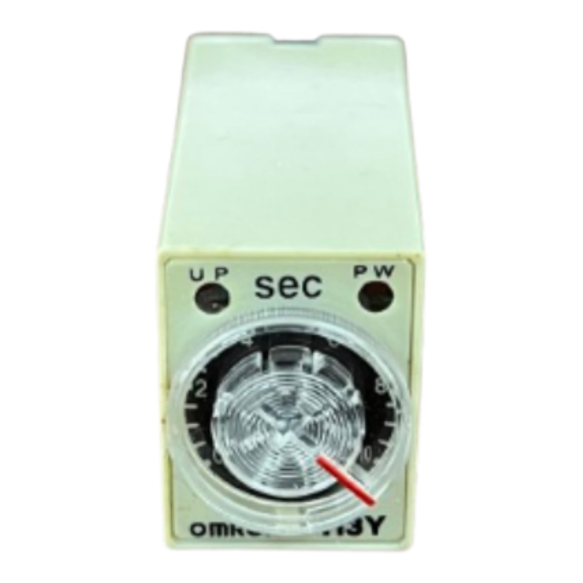 A small rectangular electrical timer switch with a cream-colored plastic housing, featuring a circular dial with a clear protective cover and a red pointer needle.