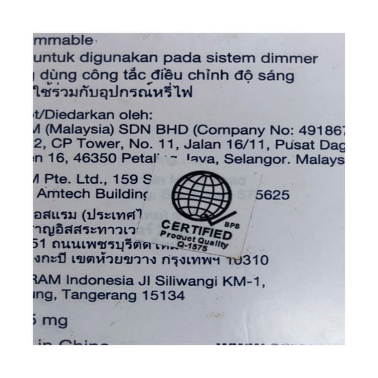 A close-up of a printed product label with mostly black text on a white background, including a 'CERTIFIED Product Quality' emblem and Malaysian company details.