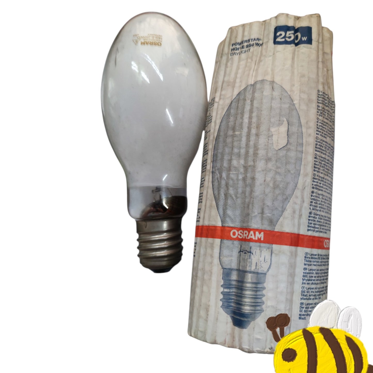 Osram light bulb next to its packaging on a white background