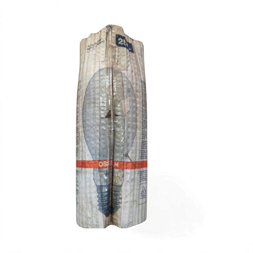 A tall, narrow packaged product standing upright on a white background. The package appears to be a corrugated or printed box with a large gray bulb illustration, blue text near the top, and a red horizontal band with white lettering.