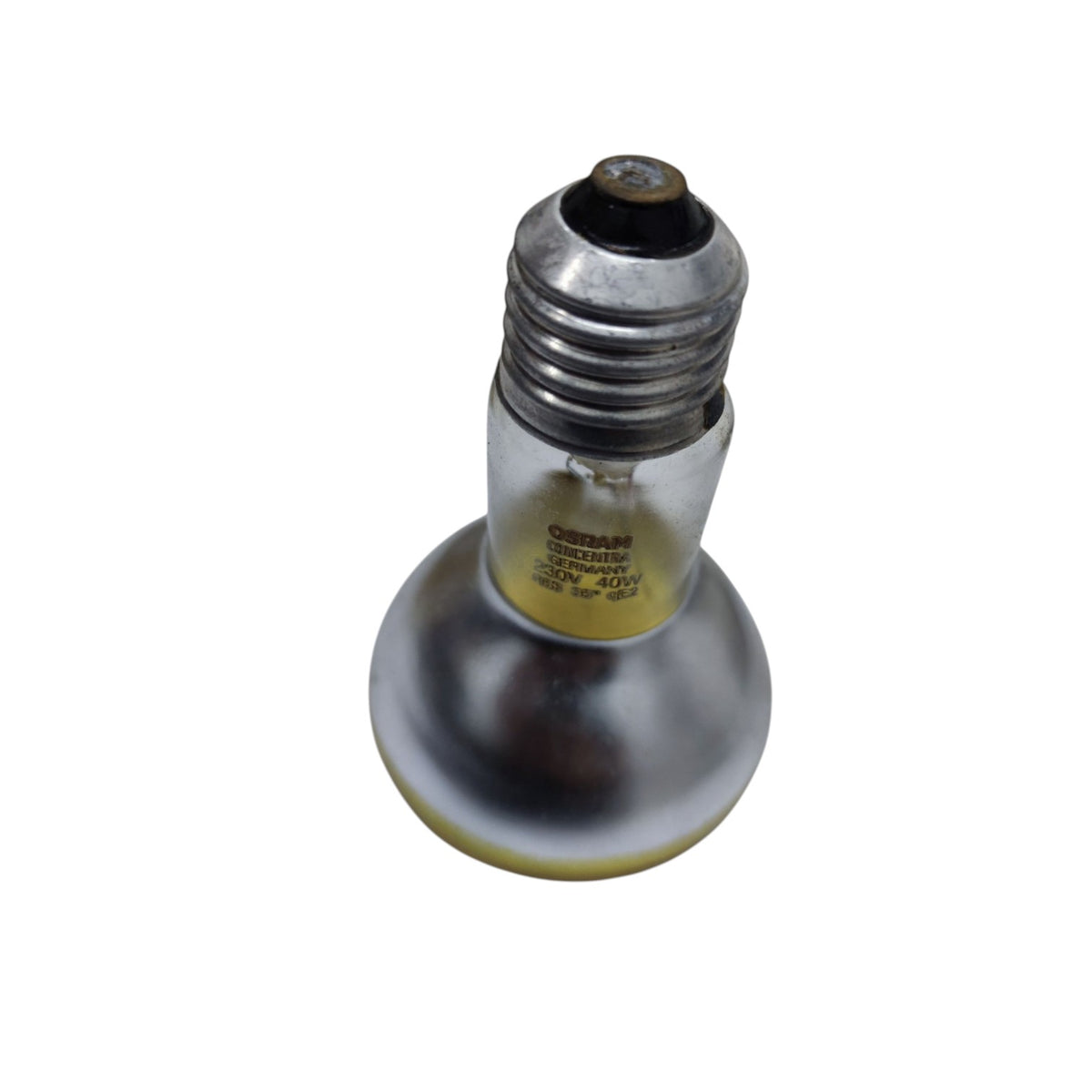 A used Curran 40W 110V incandescent light bulb with a silver screw base and a reflective glass bulb, shown on a white background.