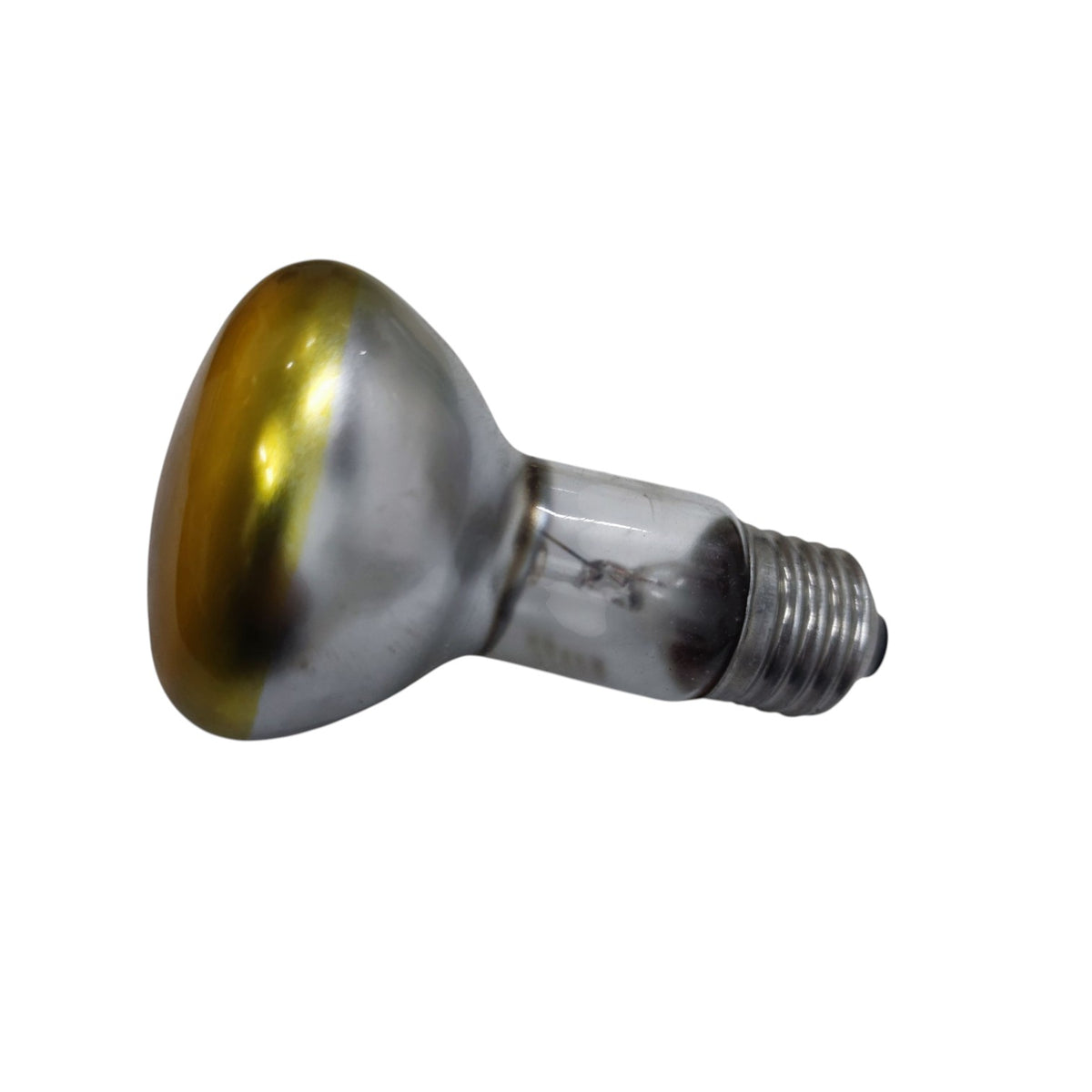 A single incandescent light bulb with a clear glass body, a metallic silver screw base, and a reflective dome that is half gold and half silver, shown against a plain white background.