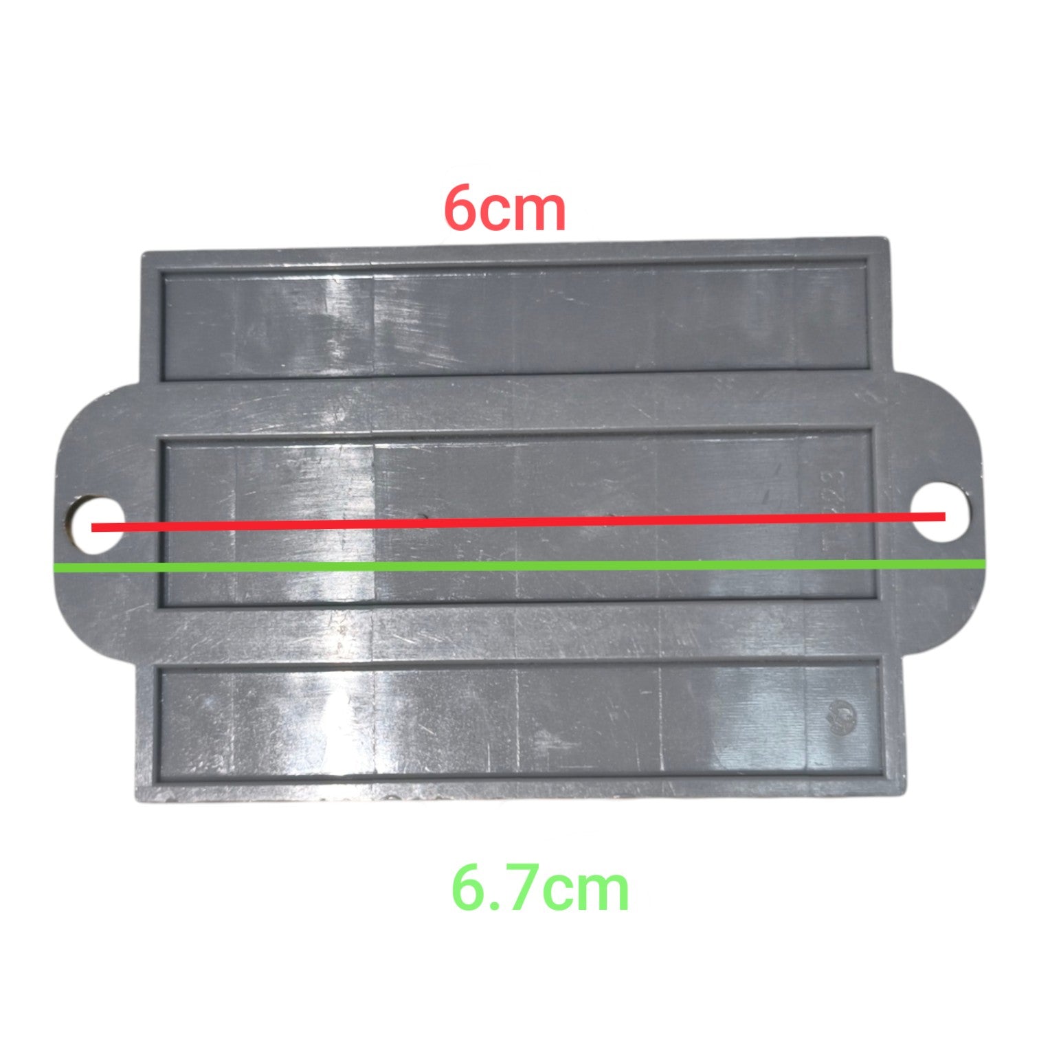 Metallic rectangular component with measurements on a white background