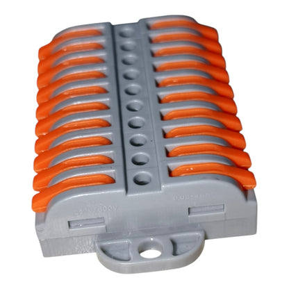 Stack of gray and orange plastic clips on a white background