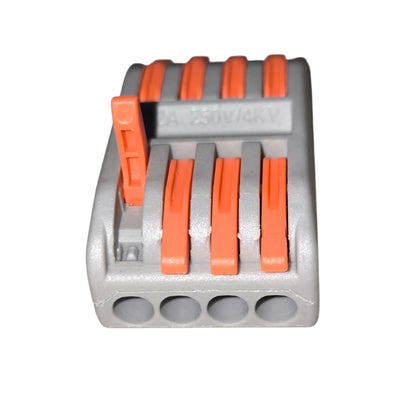 Gray and orange plastic component on a white background