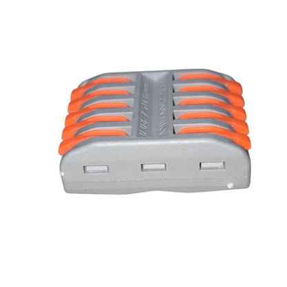 Stack of gray and orange batteries on a white background