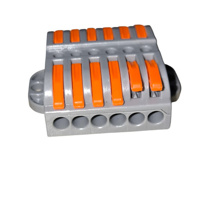 Electrical connector with orange slots on a white background