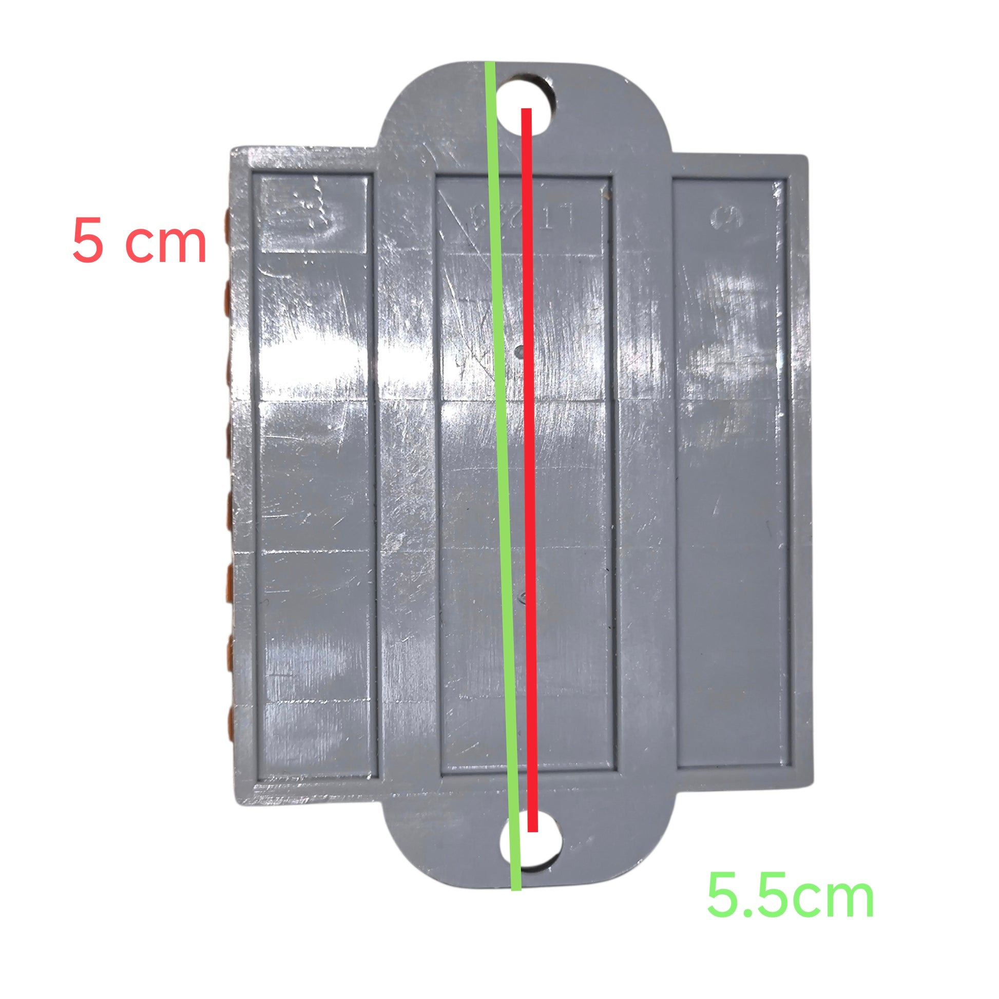 Metallic object with measurements indicated on a white background