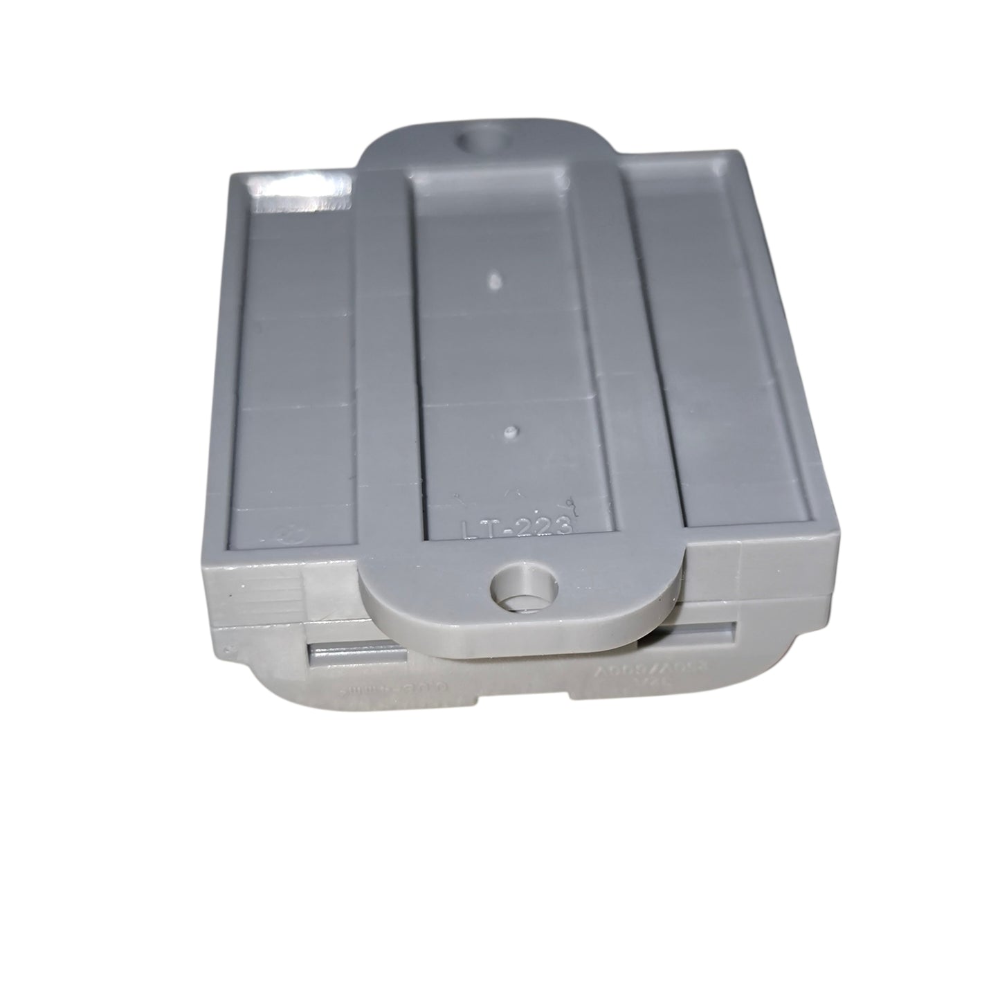 Gray plastic component on a white background