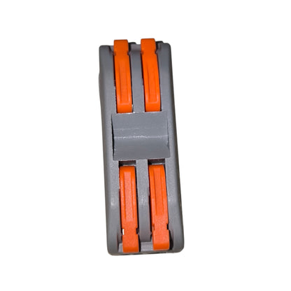 Gray and orange plastic clip on a white background
