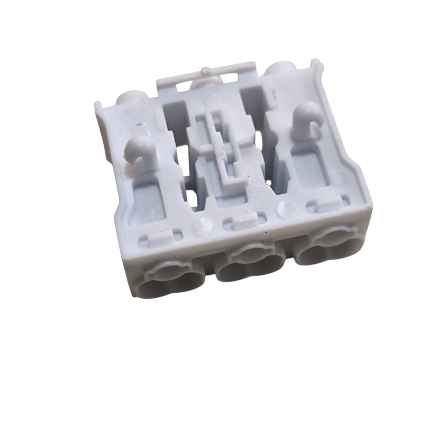 White plastic component on a white background