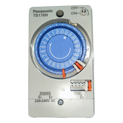 Panasonic timer switch with blue dial on a white background