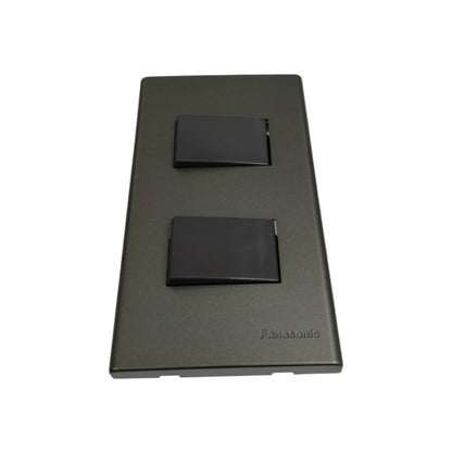 Panasonic 2 gang 4 way switch in sleek black finish with two rectangular rocker switches