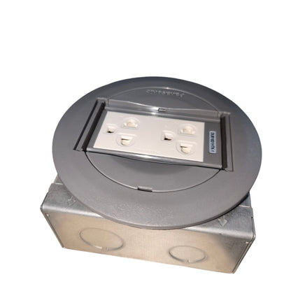 A circular gray electrical outlet cover with a built-in four-outlet power strip on top, mounted on a galvanized metal junction box against a white background.