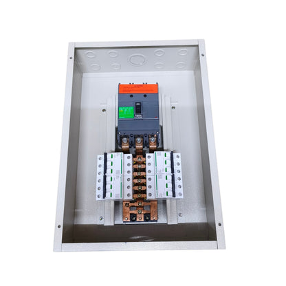 An open metal electrical distribution box containing a main circuit breaker, fuses, and terminal blocks on a plain white background.